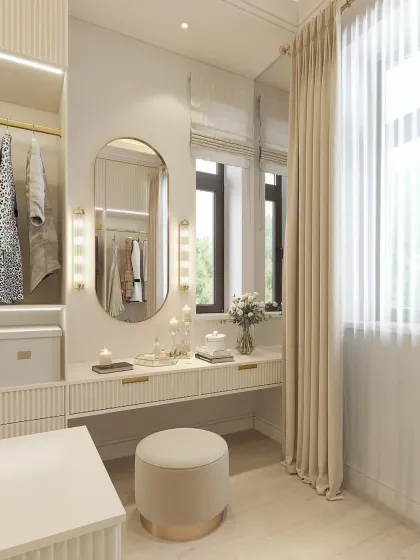 The vanity corner of the cream closet is a perfect example of functional elegance, with a well-lit mirror and ample drawer space for cosmetics and personal items.