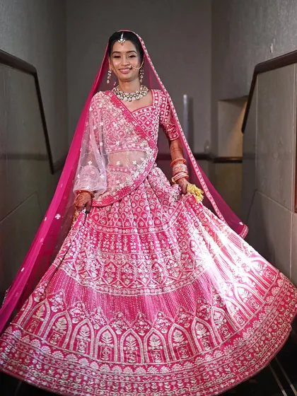 A twirl to show off the gorgeous lehenga and the complete bridal look. The makeup remained flawless, ensuring she looked perfect from head to toe.