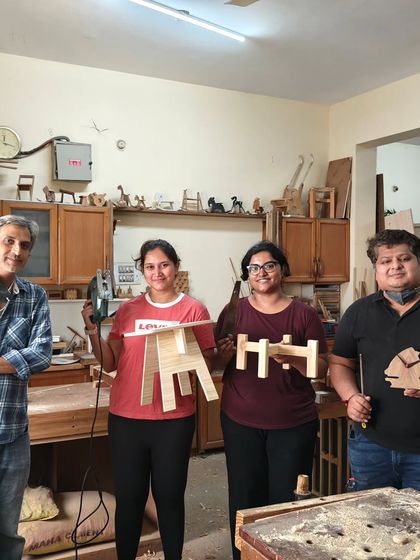 A great weekend group holding their finished projects. We made everything from small stools and planter stands to boxes. It's amazing to see what you can create in just a couple of days.