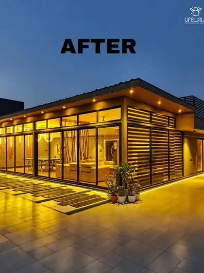 The "after" shot of a large-scale terrace transformation. We built a complete glass house structure with an adjoining patio, turning the rooftop into a true extension of the home.