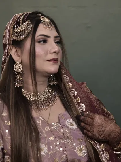 A classic portrait of the engagement bride. The makeup enhances her features, giving her a timeless and elegant look.