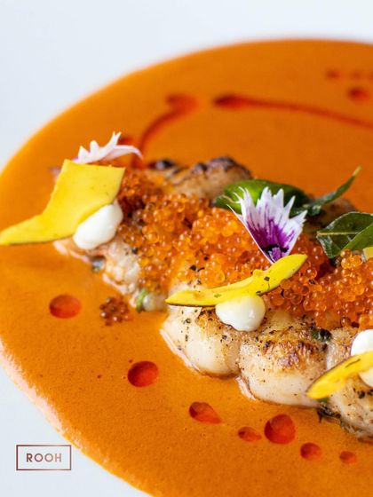 My interpretation of a Goan Prawn Curry. Here, succulent prawns are served in a classic coconut-based gravy and topped with tobiko for a surprising pop of texture and salinity.