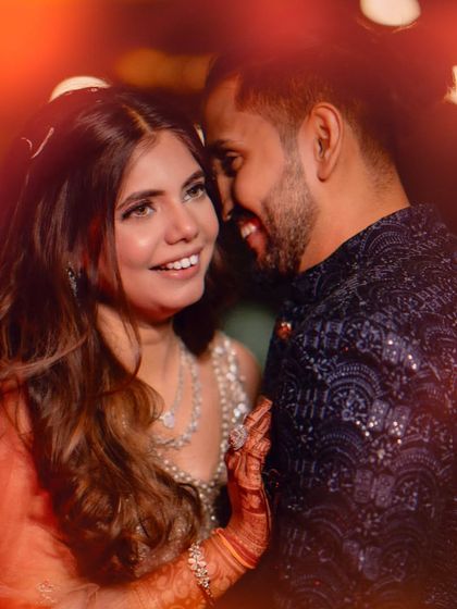 An intimate and romantic photo. The soft glam makeup enhances the warmth and love in this beautiful moment.