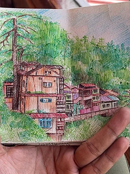 The finished pen sketch of the houses nestled in the green hills. This quick study, done from my window, captures the unique architecture and lush surroundings of the mountains, perfect for a personal travel sketchbook.
