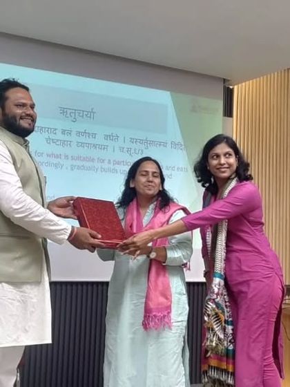 Receiving a token of appreciation from the faculty at ITM. I am grateful for the opportunity to share my knowledge and passion for Ayurveda with such an enthusiastic audience.