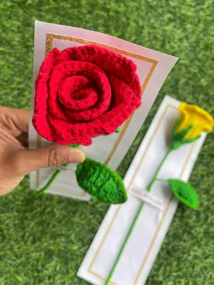 A large, handmade red rose, perfect as a single, impactful gift. This one is presented on a simple card.