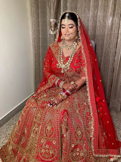 Sonakshi looked so glowing and ethereal. I loved dolling her up in this classic red lehenga, creating a look that was both traditional and radiant.