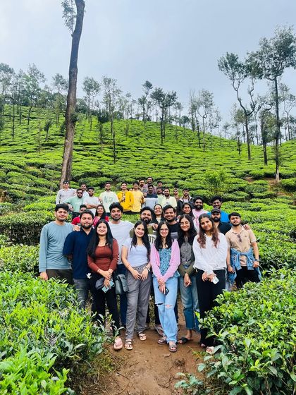 A full team picture in the vibrant green tea estates. These trips are perfect for corporate teams looking for a refreshing escape from the city and a chance to connect with nature.