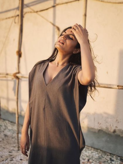 This shot captures a moment of the subject enjoying the sunlight, creating a natural and peaceful mood.