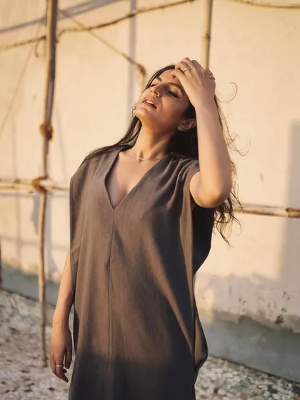 This shot captures a moment of the subject enjoying the sunlight, creating a natural and peaceful mood.