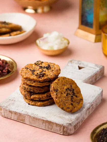 Savory mathri crackers styled for a festive hamper. We shoot both sweet and savory items to provide a complete portfolio for festive collections.