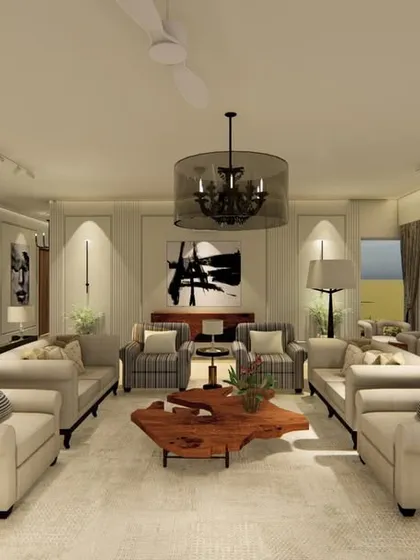 This wide shot captures the open-plan living and dining room, designed for effortless entertaining. The layout emphasizes space and light, with a consistent neutral palette and elegant furniture creating a harmonious flow.