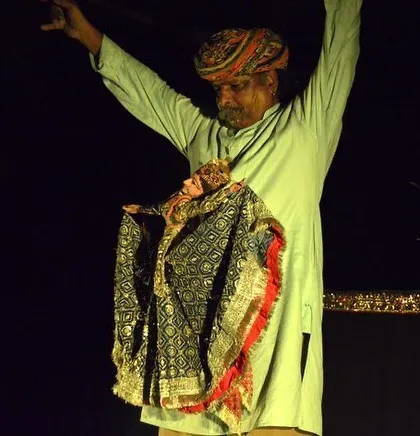 Performing at the La Puntual theatre in Barcelona, Spain. The dark background of the theatre makes the colours of the puppets stand out beautifully.