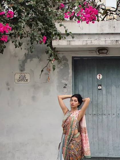 Another shot from the Pondicherry series, showing a full-length view of the saree against a picturesque backdrop.