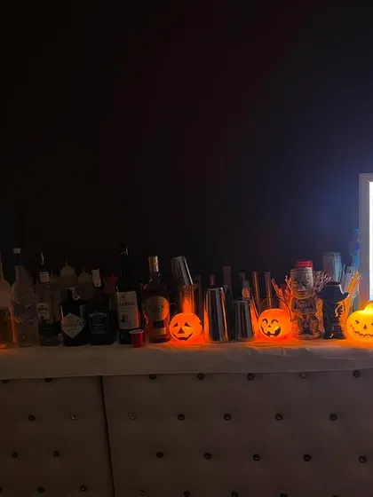 The full view of our Halloween bar, complete with glowing pumpkins and our illuminated 'BAR' sign.