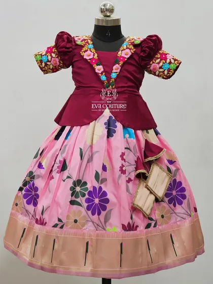 A similar design with a pink floral skirt, showing how the same blouse style can be paired with different prints.