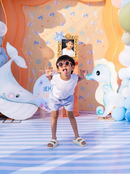 A candid shot of the birthday boy being silly and having the time of his life. This is what a successful party looks like to me.