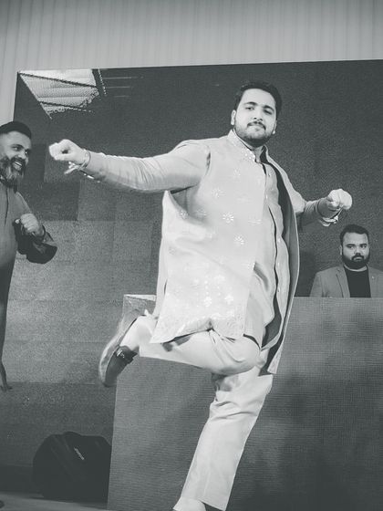 A dynamic action shot of the groom's performance. We focus on creating high-energy moments that look amazing on camera.