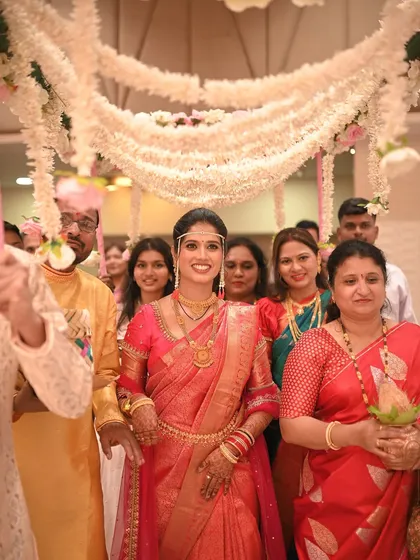 A full view of the bride's entrance, looking confident and beautiful.