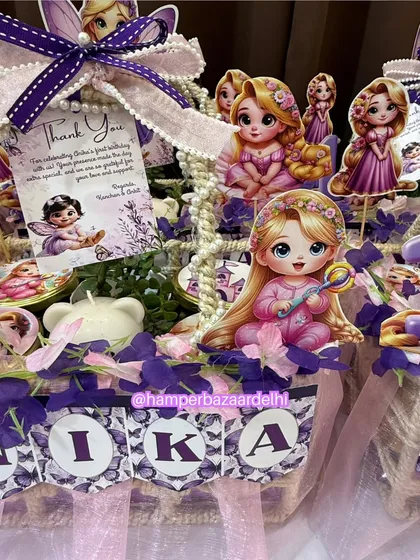 The personalized name banner and thank you card make each Rapunzel hamper feel extra special.