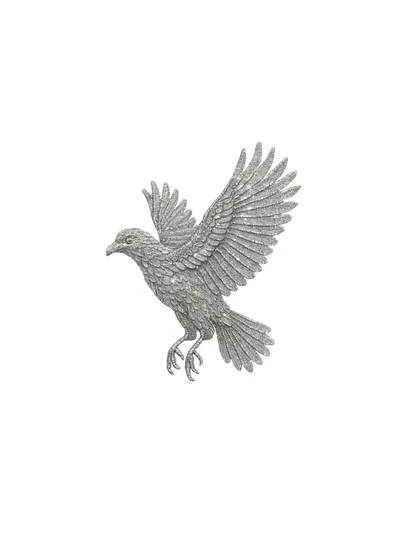 An isolated view of the hand-embellished bird motif. Each sequin is carefully placed to create a soaring silhouette, a symbol of freedom and elegance.