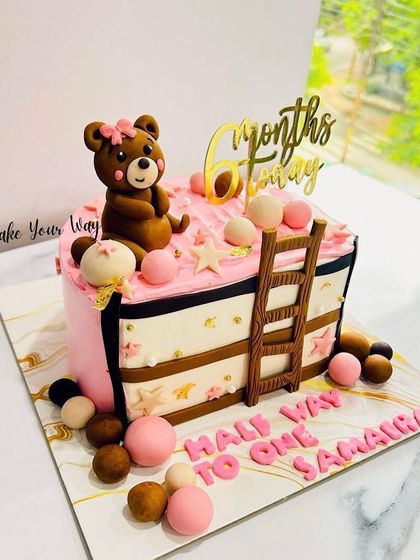 Six months of joy, love, and baby giggles. A pink teddy bear cake for a half birthday.