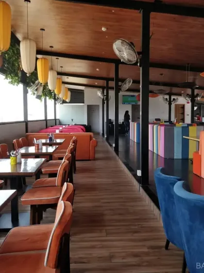 We bring the same energy to commercial spaces. For Gilly's Resto-Bar, we created a vibrant, multi-level experience with bold colors, custom seating, and dynamic lighting to match their fun atmosphere.