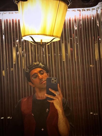 A great example of a curated client look. This selfie shows off a cool, edgy vibe with a burgundy vest and a butterfly-adorned beret. It’s all about mixing and matching pieces to create a unique style.
