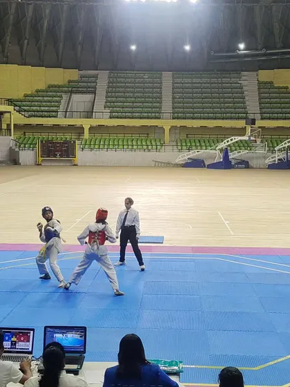 A match in progress at the "Champion of Champions" event. We prepare our students for the pressure of competing on a large stage.
