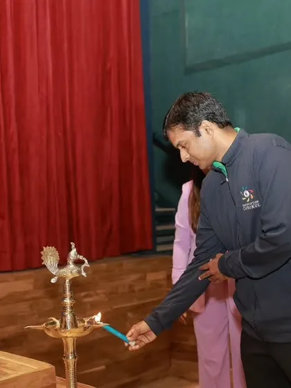 Mr. Gopichand inaugurating the new Pinnacle Pavilion at Crimson Anisha Global School in Pune by lighting the ceremonial lamp.