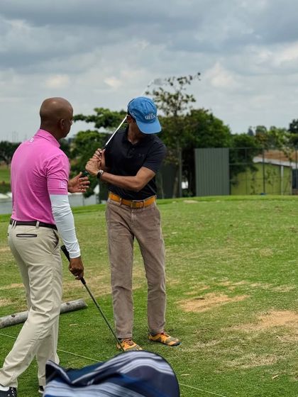 Even the experts need a few tips. Here, I am giving my nutrition coach a quick pointer on the driving range. Our collaborations are built on mutual respect and a shared passion for performance.