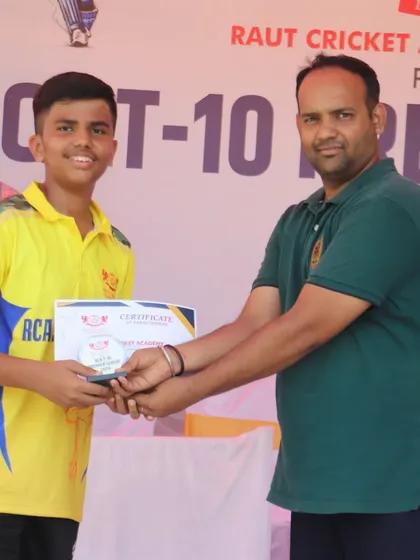 Another player from the RCA Super Kings receiving his award.