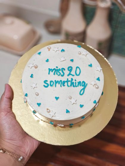 A "miss 20 something" bento cake for a birthday. The simple writing and scattered star and heart sprinkles make it a really cute and personal gift.