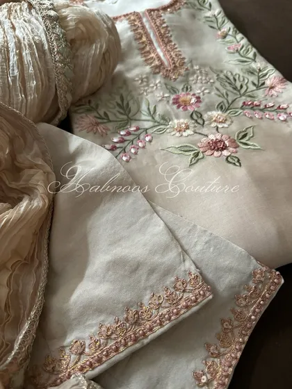 A detail shot of the silk chanderi suit, showing the embroidered lower and the crushed silk dupatta.