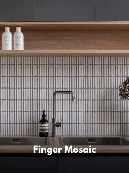 Finger mosaic tiles create a subtle, textured look. Their slim, vertical shape adds a sense of height and a clean, contemporary feel to a kitchen backsplash.
