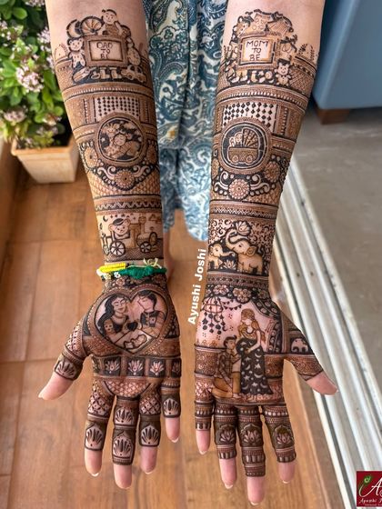 This baby shower mehendi tells a story with portraits of the couple, a baby in a cradle, and even the family dog, all surrounded by traditional patterns.