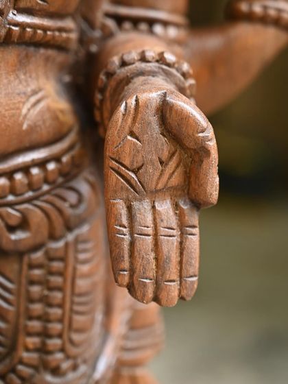 A detail of the hand of the 24-inch Murugan statue, held in a gesture of blessing.