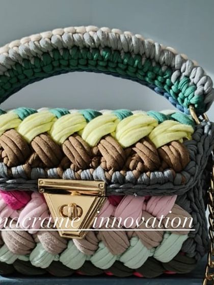 A beautiful multi-colored crochet puff bag with a mix of earthy and pastel tones. The color combination makes this bag so unique and versatile.