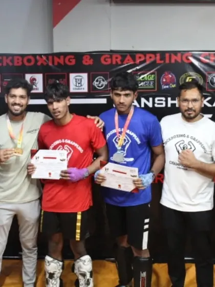 A group of our victorious fighters and coaches after a successful night at the MFC Series 2.