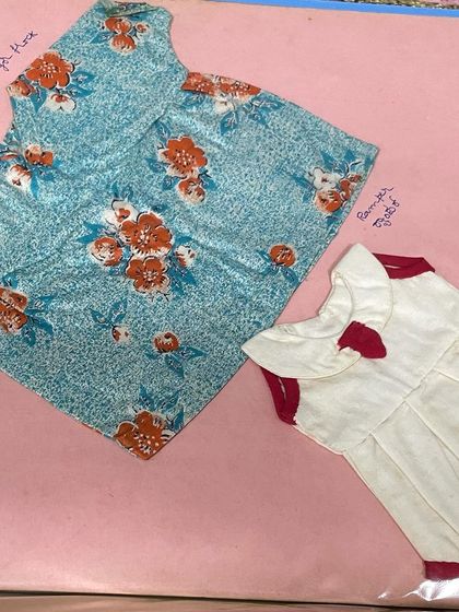 Two more miniature frocks from my mother's journal. Her ability to work with different prints and patterns was truly remarkable.