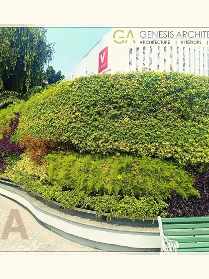 A living, breathing green wall designed for a commercial space in Bengaluru. Vertical gardens like this are a powerful way to introduce vibrant nature into urban environments, improving air quality and creating a memorable visual landmark.