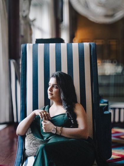 The flowy fabric and comfortable fit of this jumpsuit ensure the client feels as good as she looks. My goal is always to combine style with practicality for professional women.