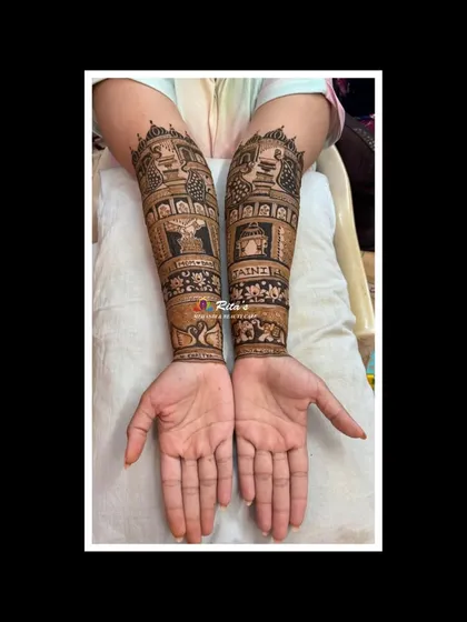 The back of the hands for a Jain-themed bridal mehendi.