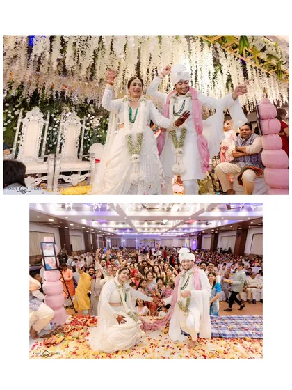 The couple celebrating on stage with their guests in the foreground. This shows the grand scale of the celebration and the love from everyone present.