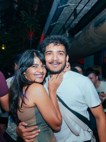 A happy couple enjoying the vibe at one of my gigs. My music brings people together.