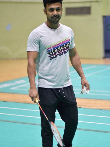 A moment between drills. Coaching is also about building a connection with players and providing constant feedback and encouragement.