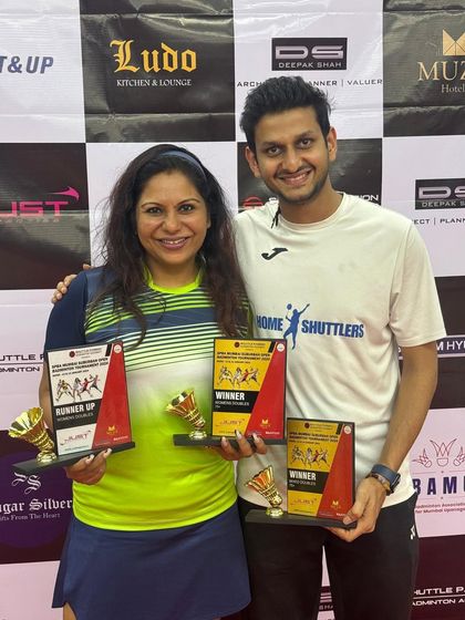 Coach Preet Kaur and her partner showcasing their multiple wins in mixed doubles and women's doubles at the Open Mumbai Suburban District Tournament. Our coaches excel in various formats of the game.