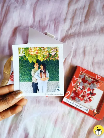 A polaroid-style photo ready to be placed in a mini album.