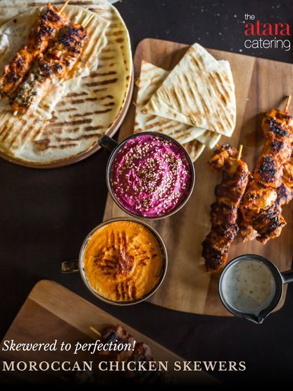 Skewered to perfection, our Moroccan Chicken Skewers are served with pita bread and flavourful dips like beetroot and roasted pepper hummus, representing our Mediterranean offerings.