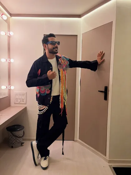 A modern, edgy look for a Navratri concert. This custom denim jacket with colorful tassels and embellishments is how I blend contemporary fashion with festive flair.